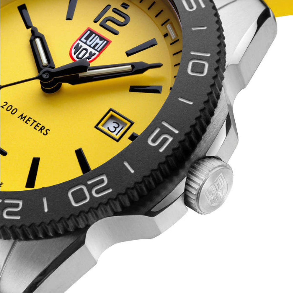 Luminox Pacific Diver 3120 Series XS.3125 close up view of crown, black bezel, and yellow dial with date window