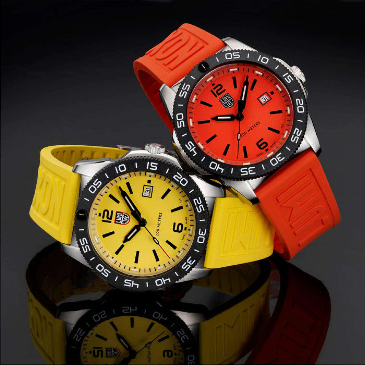 Men's diver watch with orange dial, orange silicone strap, and stainless steel case