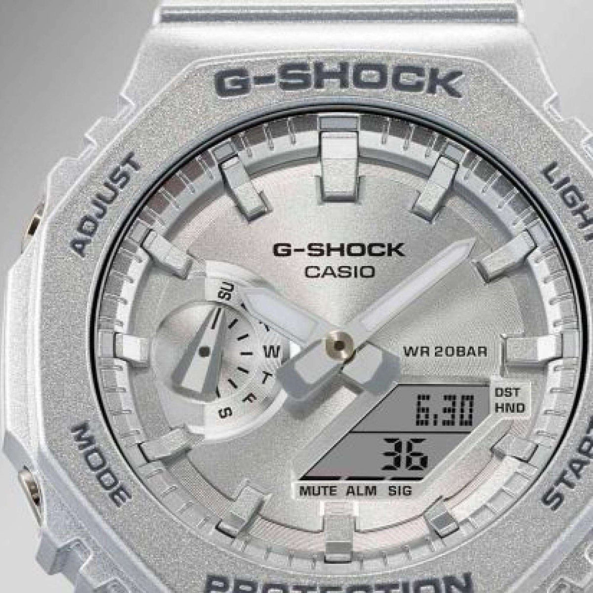 Silver G-Shock digital analog watch with angular bezel and light gray dial
