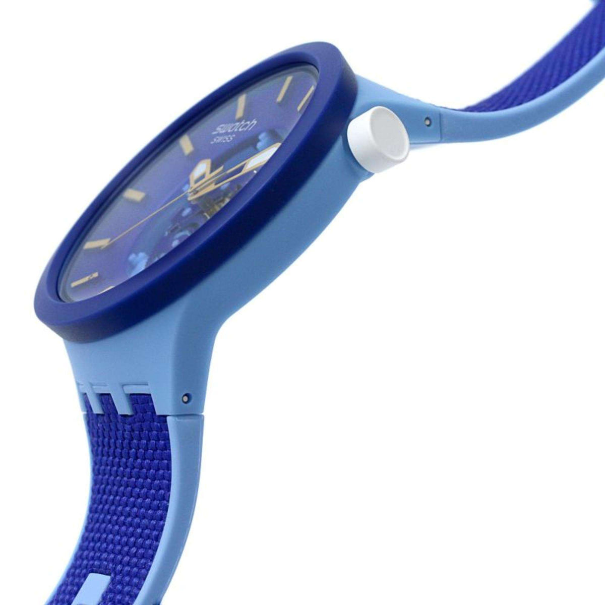Blue Swatch Big Bold watch with rounded case and blue strap, angled view