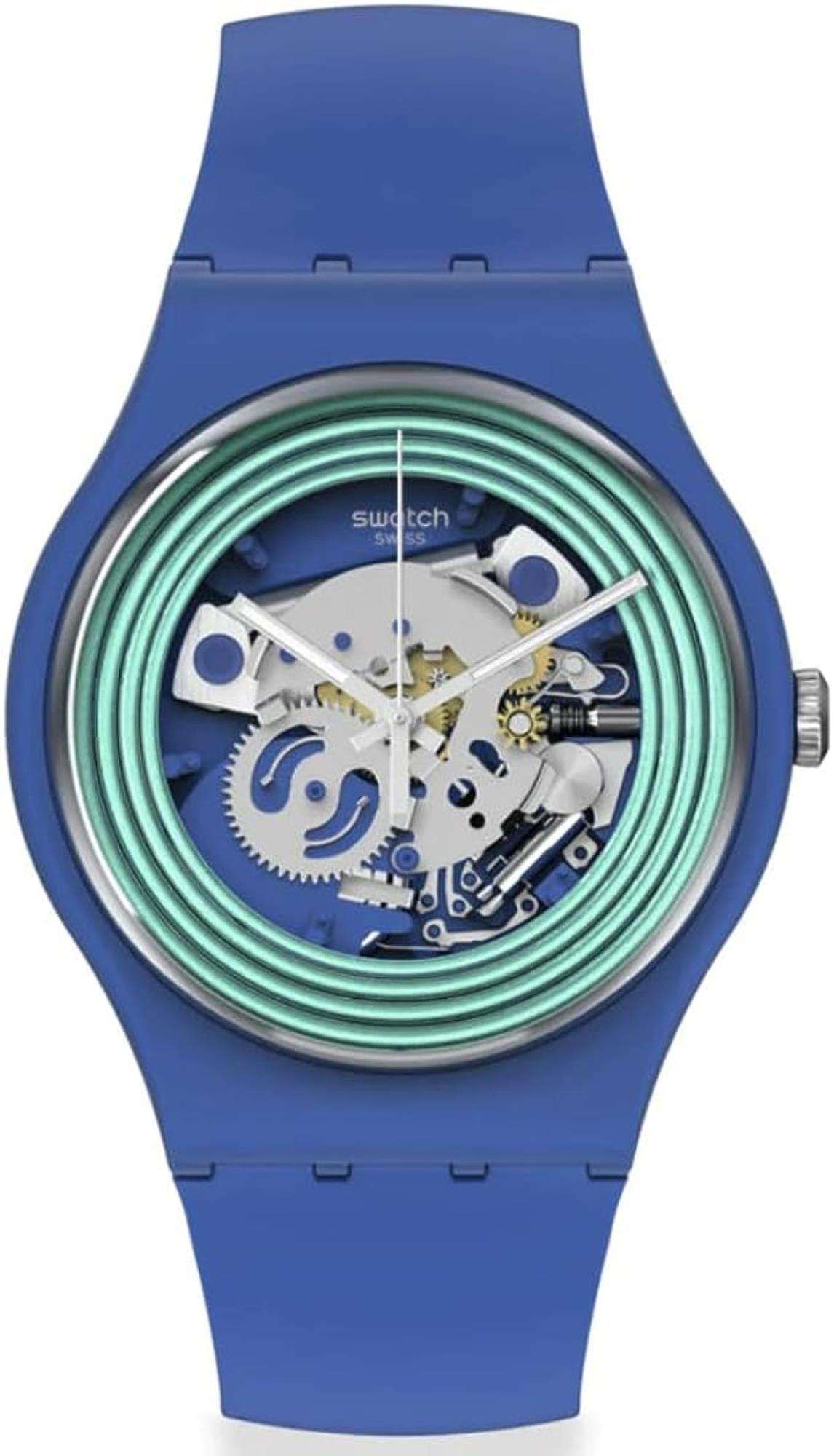 Blue quartz wristwatch with transparent dial, green bezel, visible mechanical details