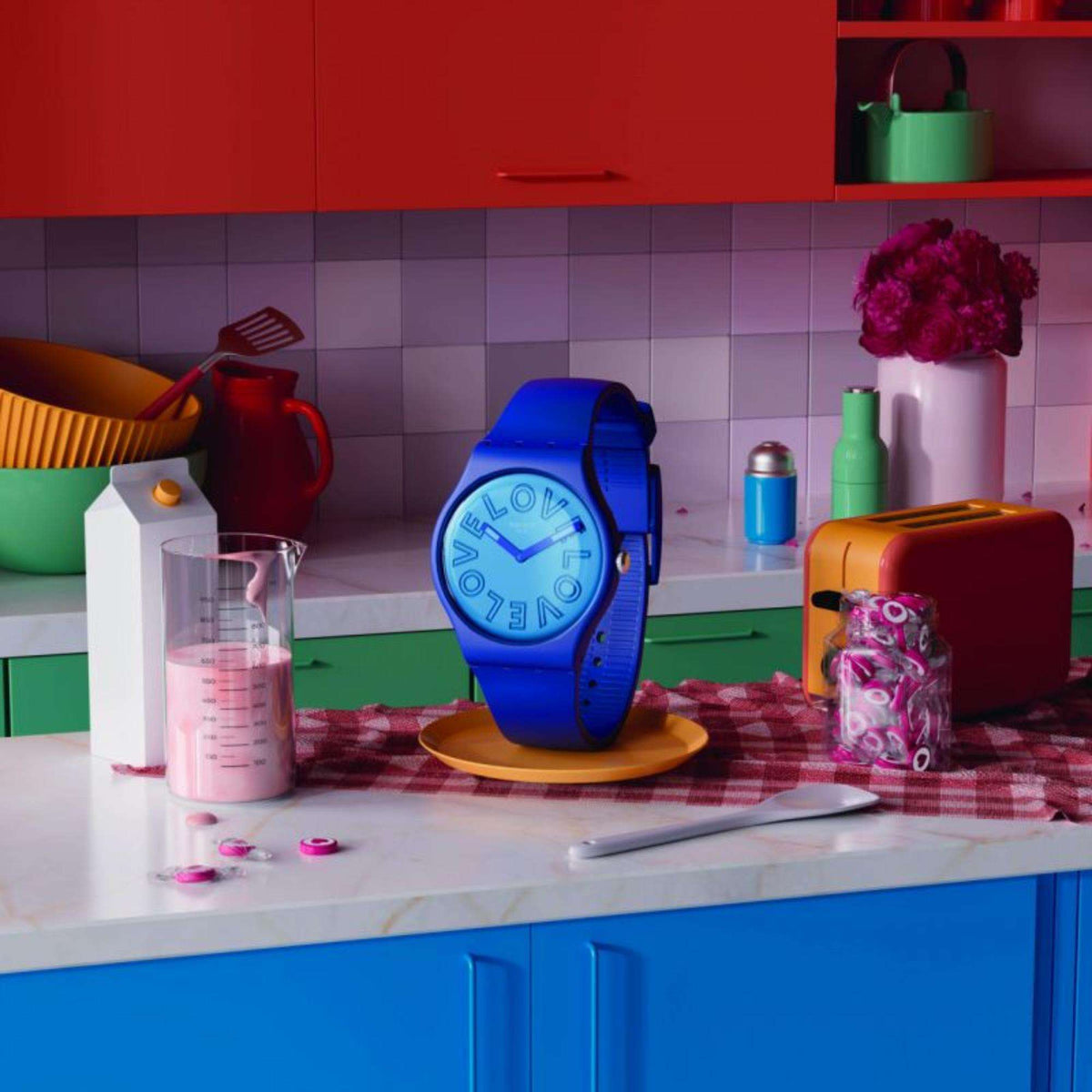 Blue silicone Swatch wristwatch with round dial and purple-blue band
