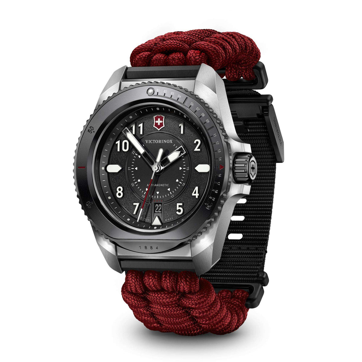 Men’s quartz wristwatch with black dial, steel case, red paracord strap, black linked bracelet.