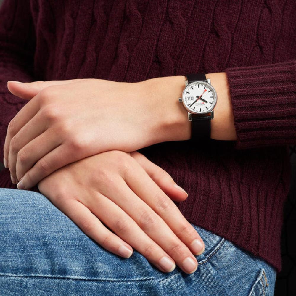On-wrist lifestyle shot of Mondaine Evo2 MSE.30210.LBV womens watch paired with a burgundy knit sweater and denim jeans