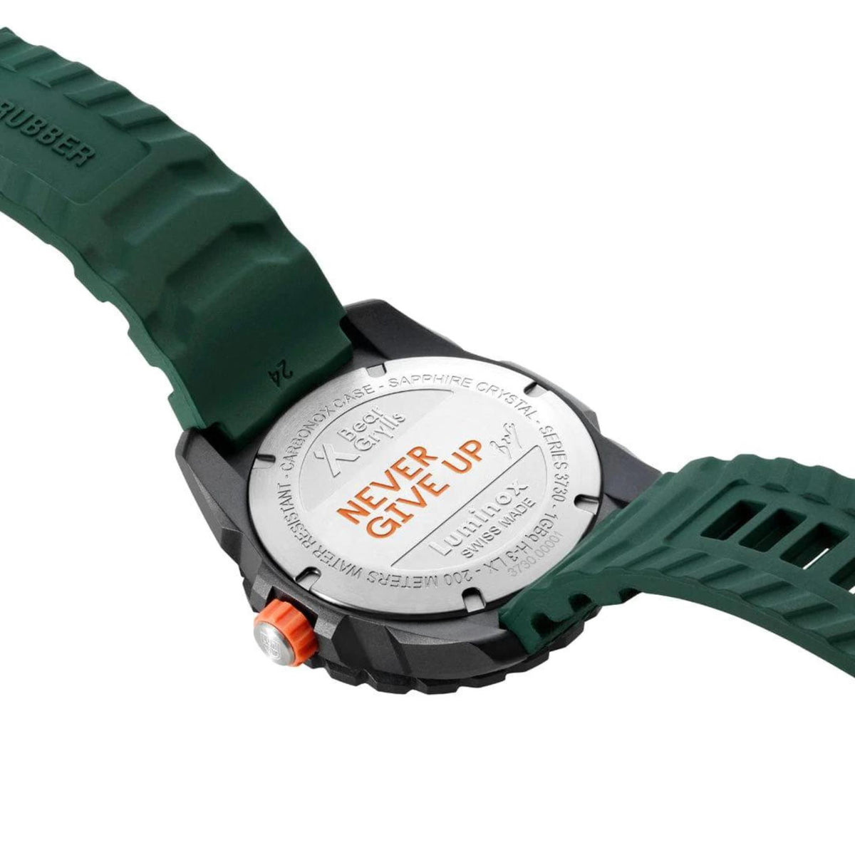 Men's quartz wristwatch case back with engraved text and orange accent on green rubber strap