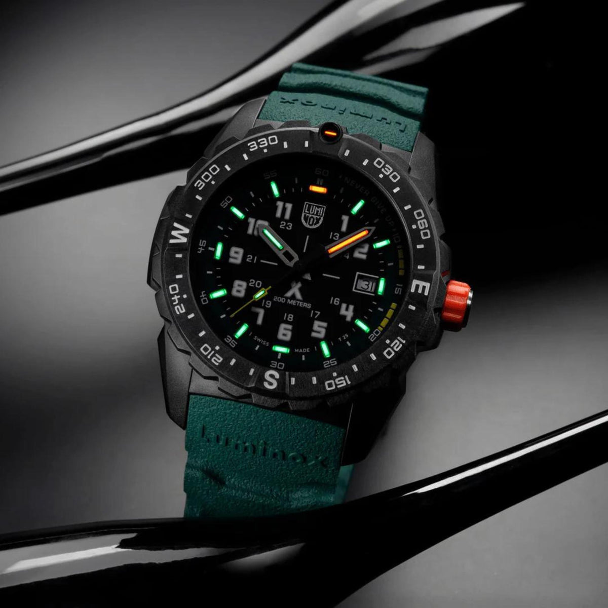 Men's rugged quartz wristwatch with dark case, green-tinged dial, and green rubber strap