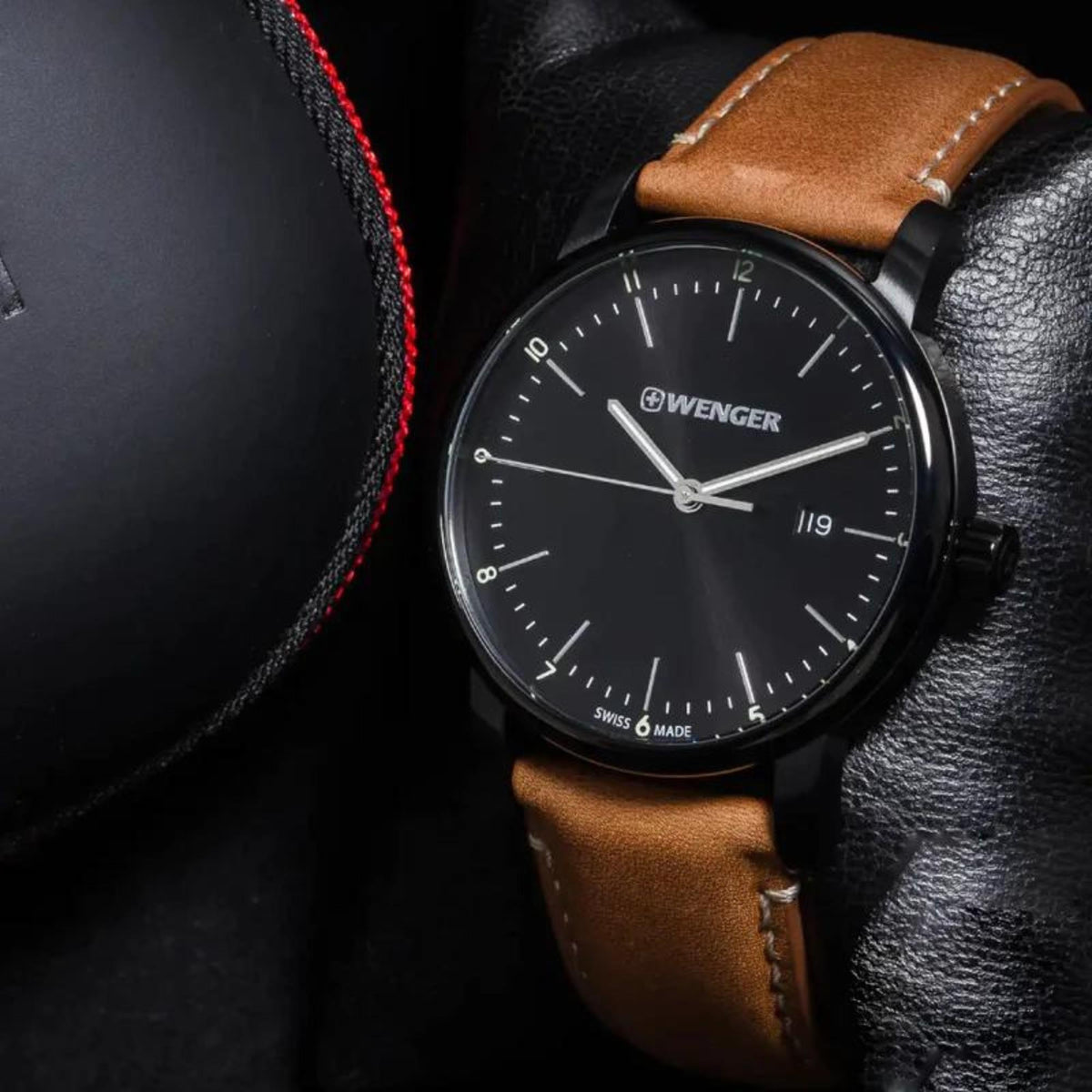 Wenger men's watch with black dial, slim hands, brown leather strap and black case