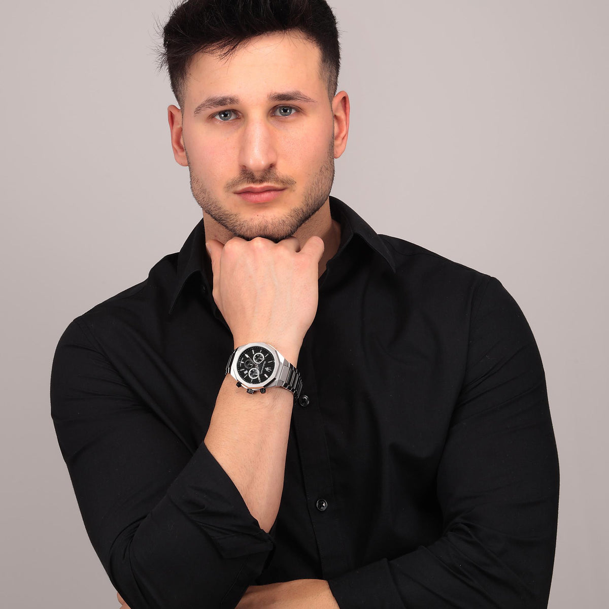 Maserati men’s chronograph watch on wrist, black dial with steel bracelet