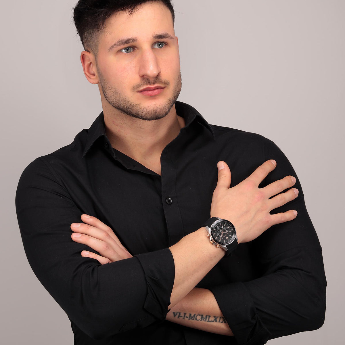 Men's Maserati chronograph watch worn on wrist with black dial and black strap