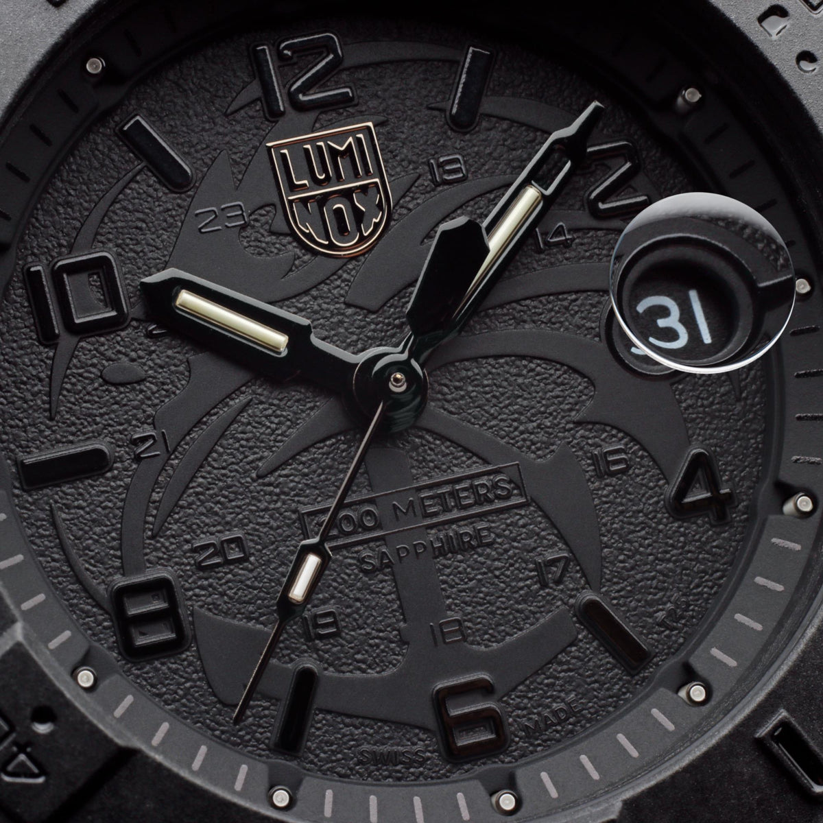 Close-up of Luminox Navy SEAL black dial with LUM logo, hands, and date marker