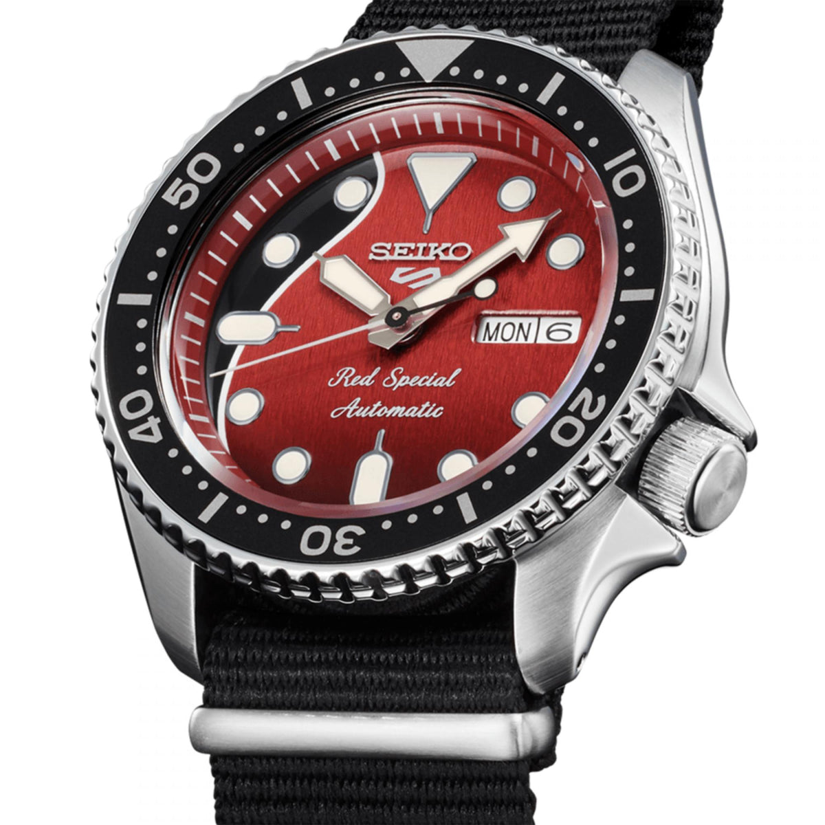 Close-up of Seiko 5 Sports automatic watch face, highlighting the detailed portion of the dial and the dive bezel.