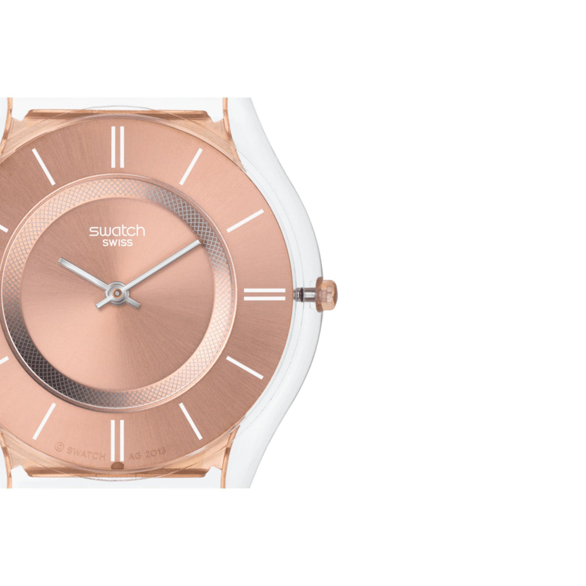 Close-up of Swatch quartz watch face with pink dial and slim silver hands