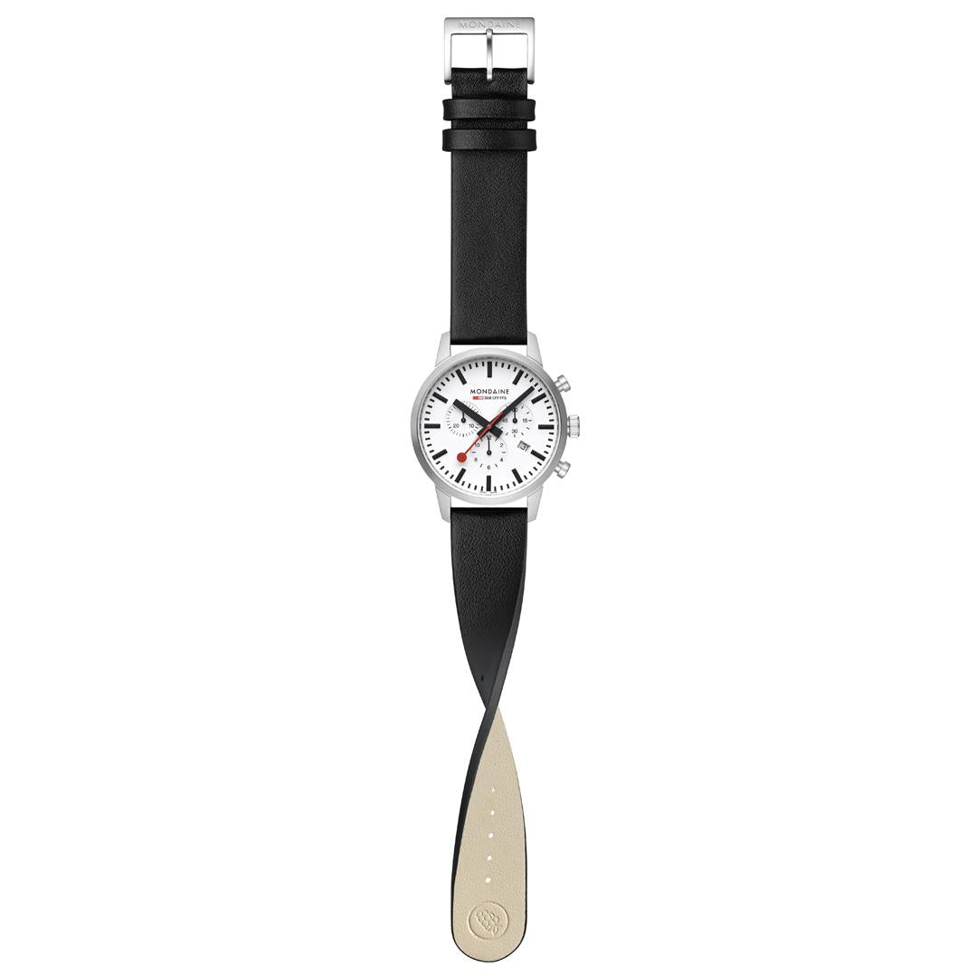 Men's chronograph watch with black leather strap and white dial; flat lay view