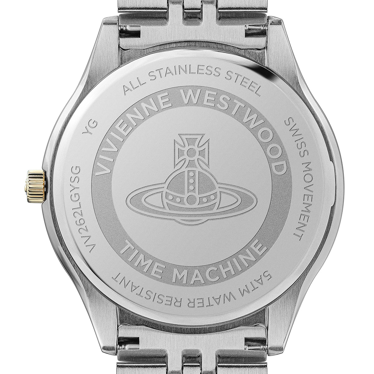 Stainless steel watch case back with engraved text and gold-tone crown