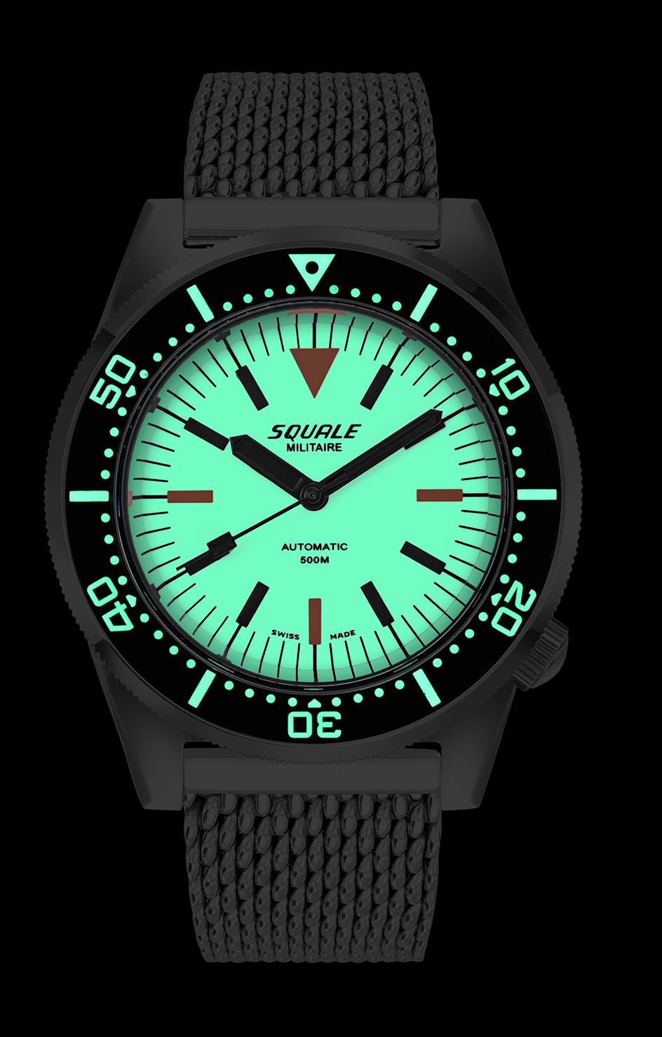 Men’s black automatic dive watch with luminous green dial, black bezel, mesh strap