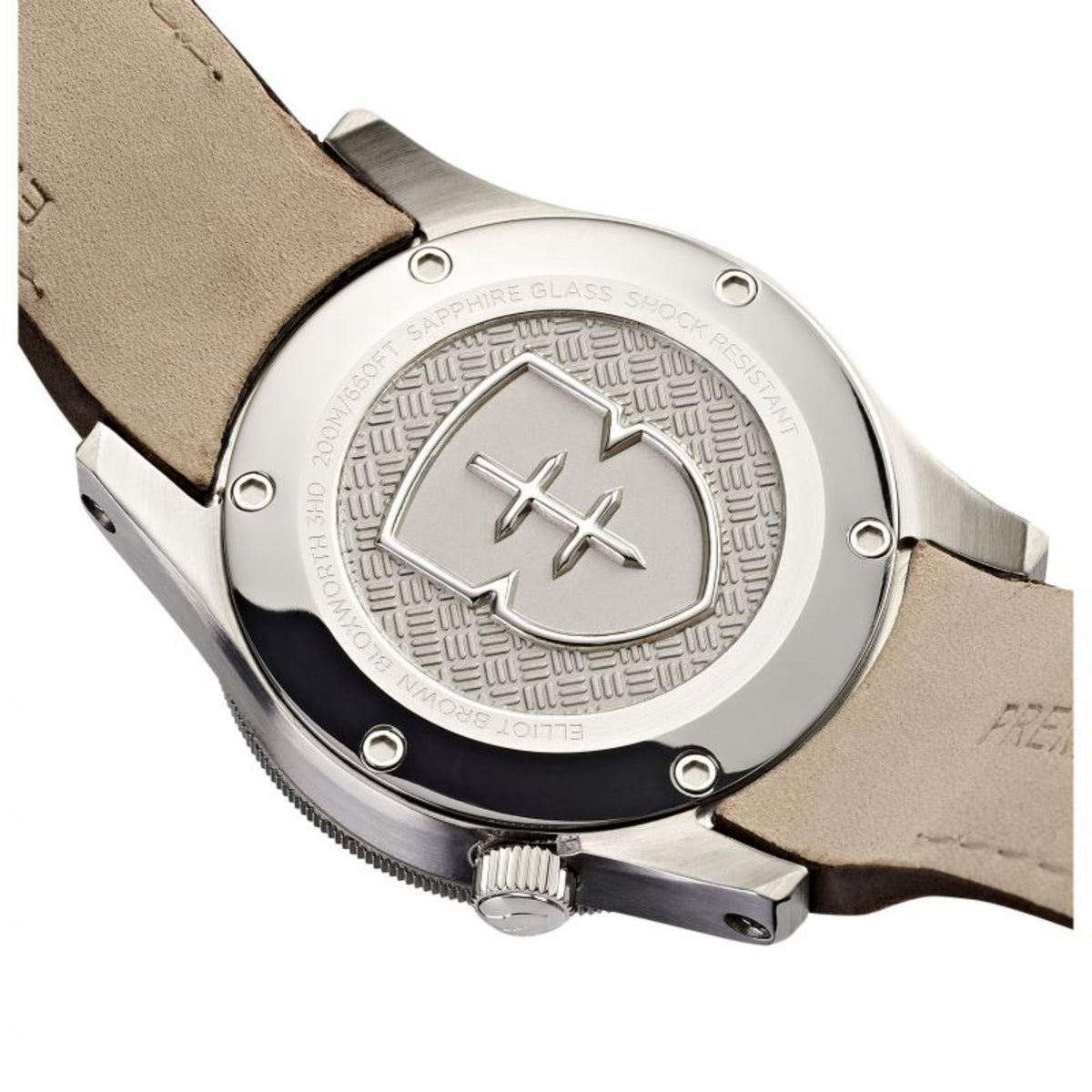 Elliot Brown diver watch case back with engraved emblem and tan leather strap