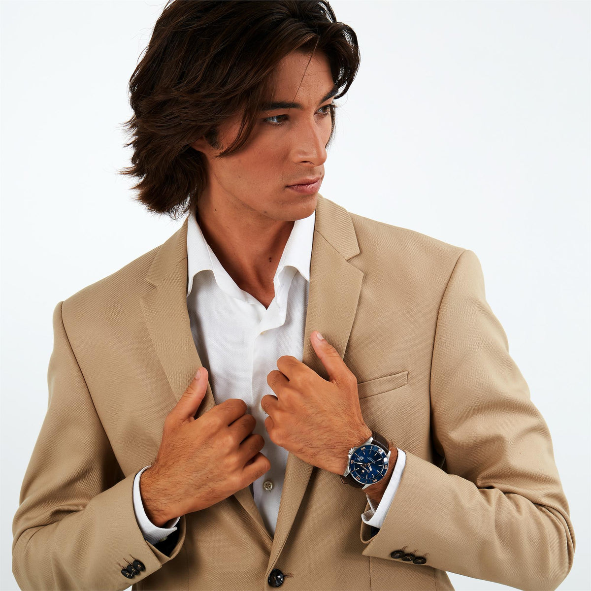 Maserati Competizione watch on wrist with blue dial and brown leather strap