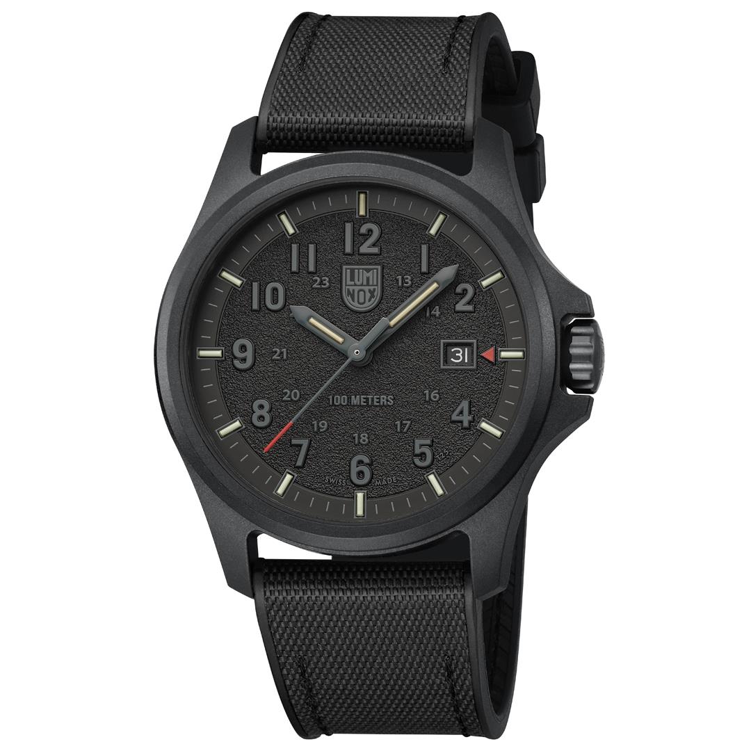 Men's black rubber strap quartz watch with dark dial, gold-tone hands, and date window