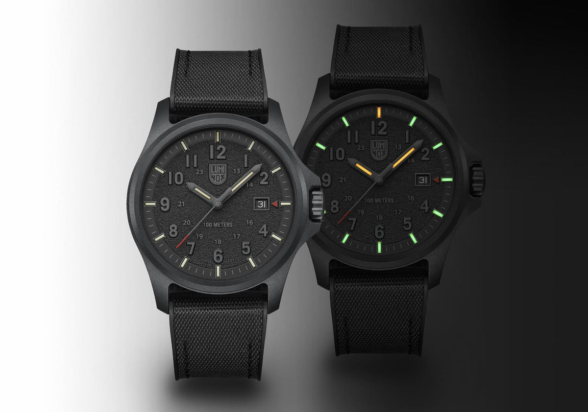 Two views of men's black rubber strap quartz field watch with dark dial and date window