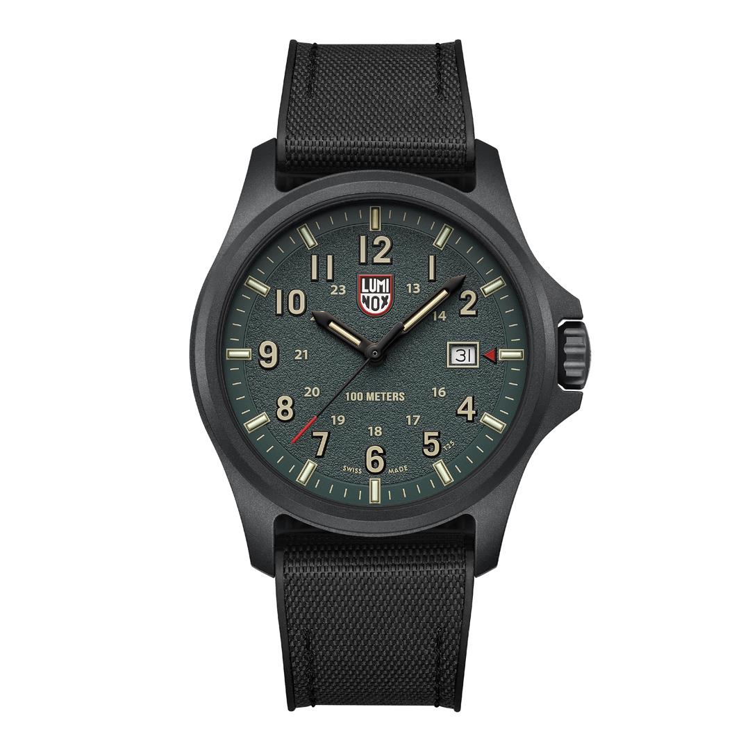 Front view of the Luminox Atacama Field XL.1977 featuring a textured dark green analog face, luminous hour markers, and a durable black rubber strap