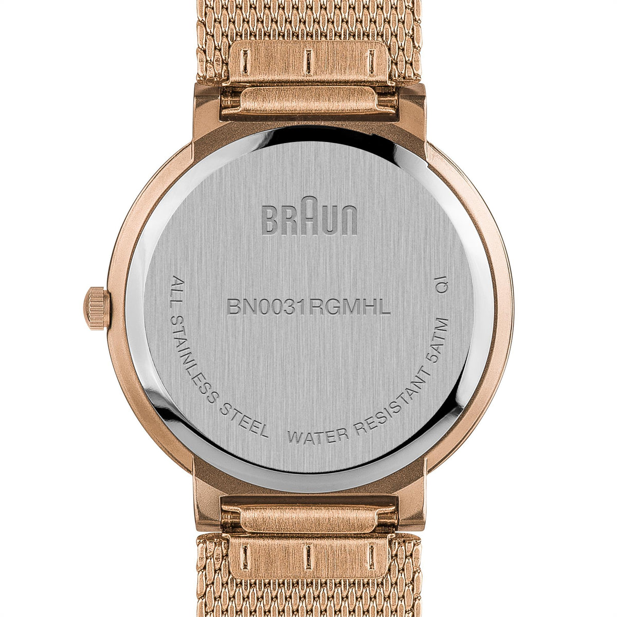 Back of gold-tone ladies watch with engraved case and water resistant text