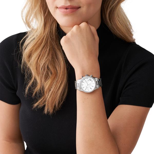 Silver dial chronograph watch on wrist with stainless steel bracelet and crystal bezel