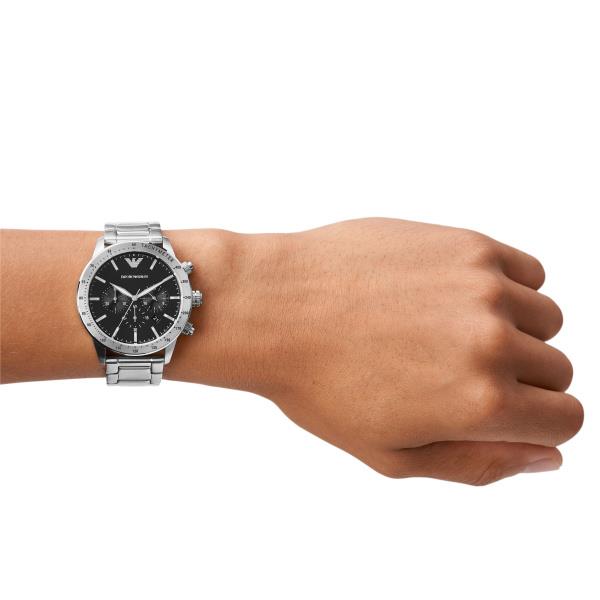 Emporio Armani Mario AR11241 mens watch with a black dial and steel bracelet worn on a wrist