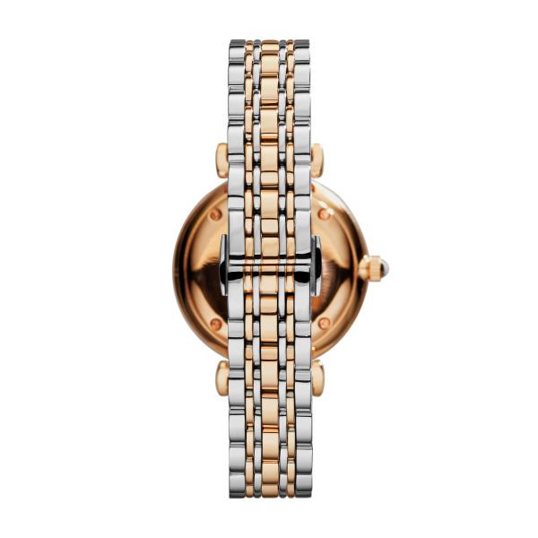 Two-tone ladies wrist watch side view, rose-gold bezel, steel bracelet and crown