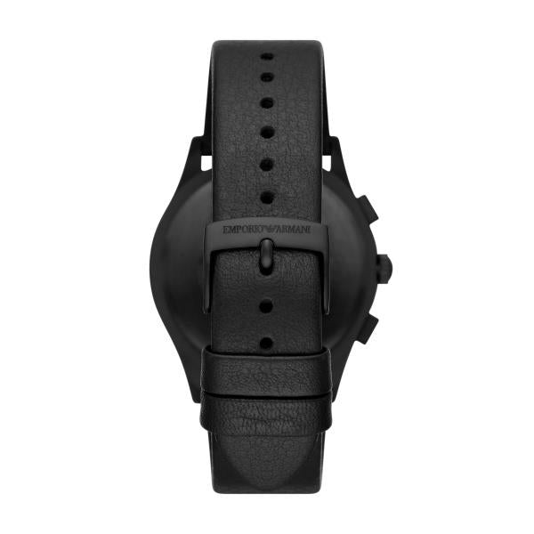 Back view of black leather wristwatch with buckle and engraved case
