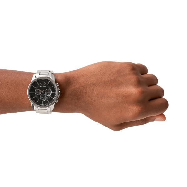 Armani Exchange chronograph watch on wrist, featuring mens black dial steel watch