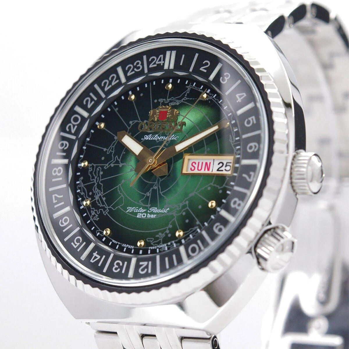 Men's automatic watch with green dial, black bezel, day-date window on bracelet