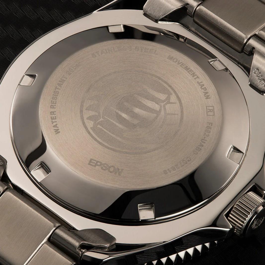 Stainless steel watch caseback with water resistance engraving and Epson branding