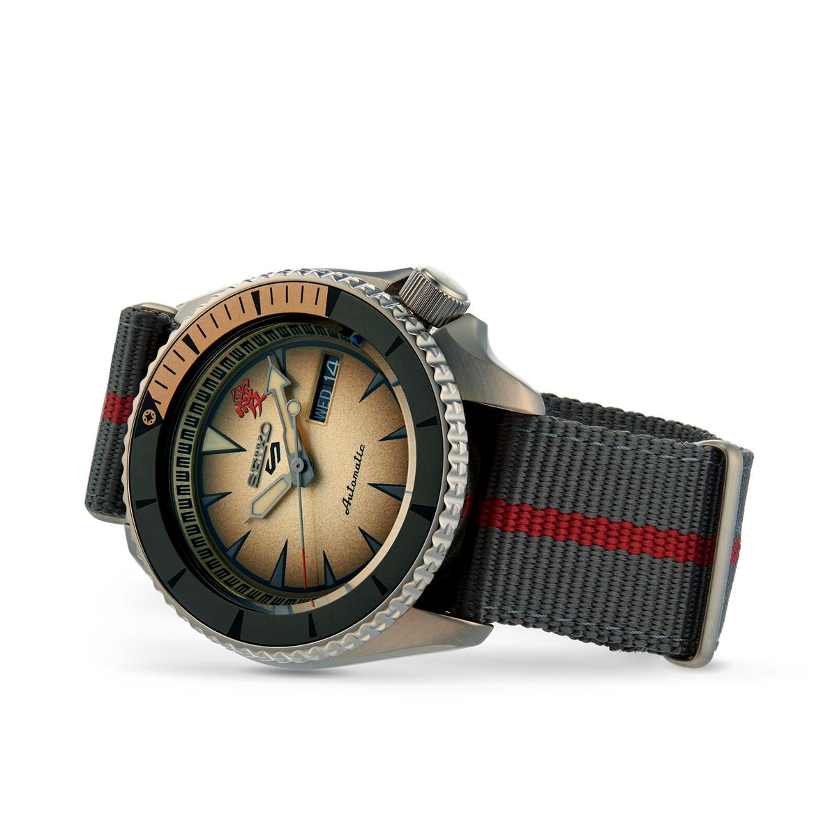 Seiko 5 Sports 42mm cream dial watch resting horizontally on a white background.