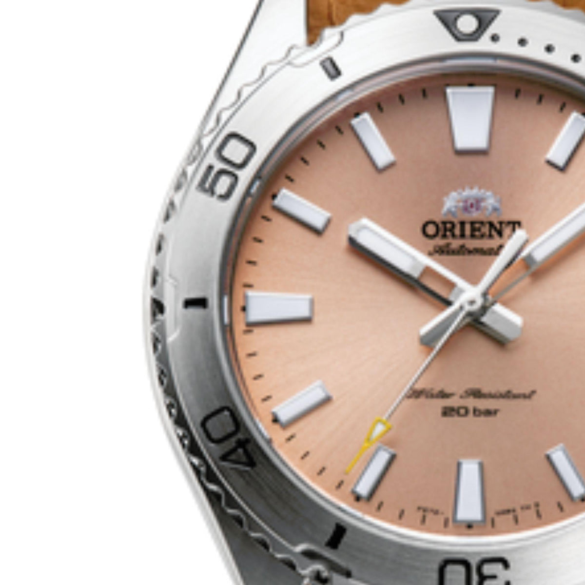 Orange dial detail with silver hands, hour markers, and top loop of brown leather strap
