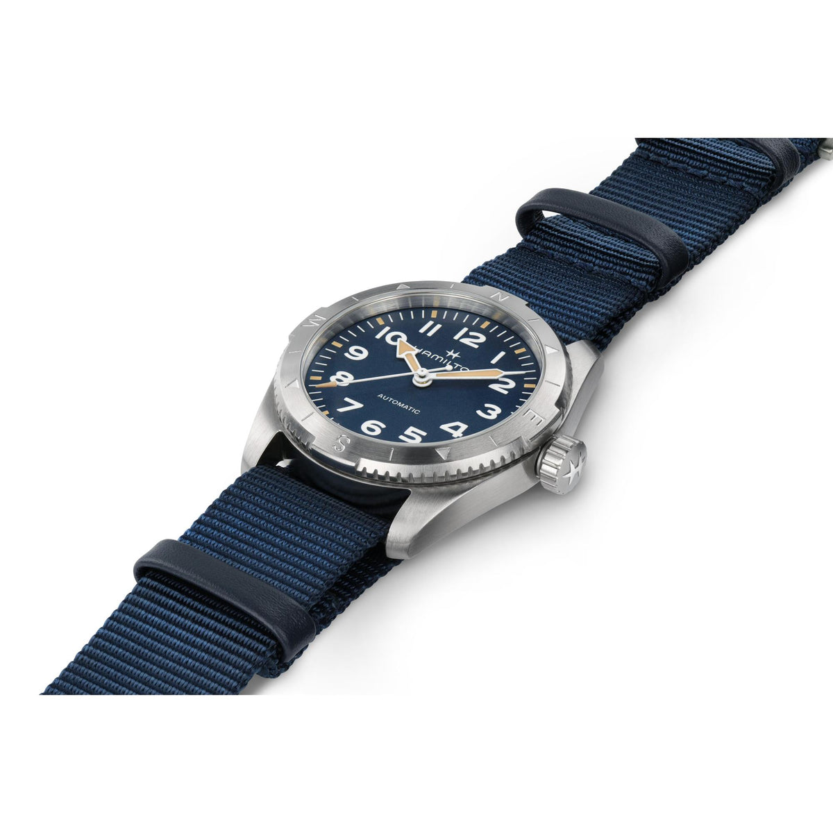 NATO strap automatic wristwatch with blue dial, silver bezel, and luminous markers