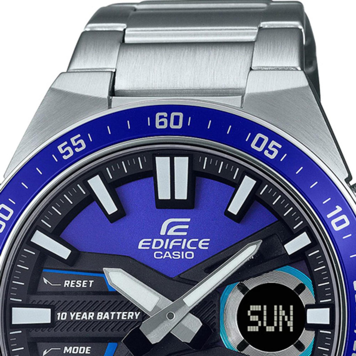Men's chronograph watch close-up, blue bezel and dial, stainless case and bracelet