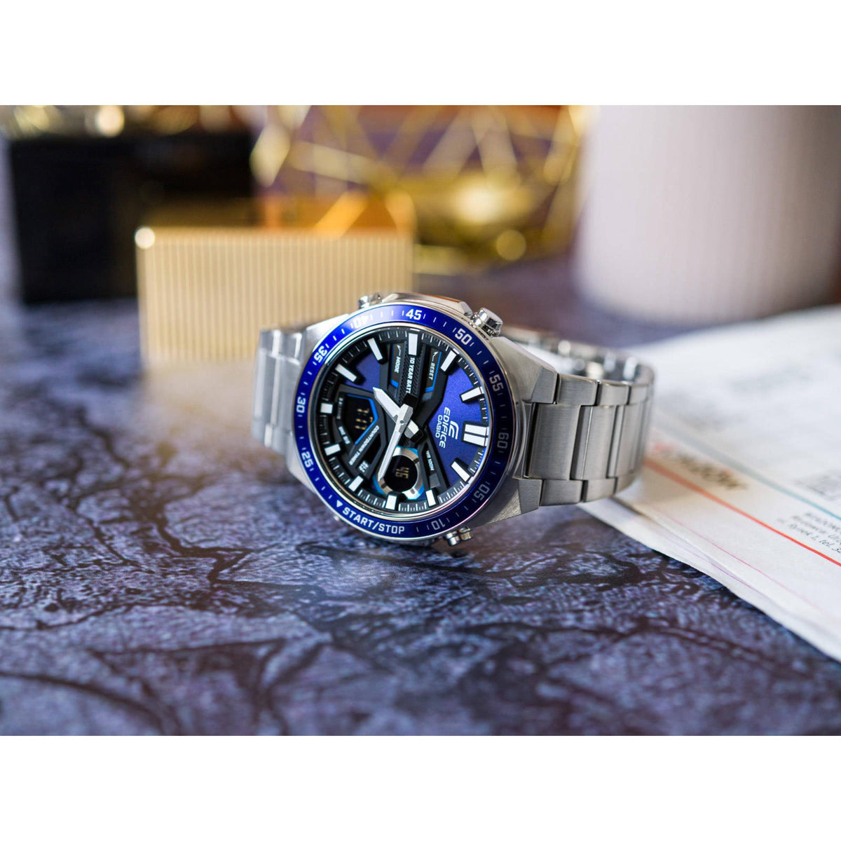 Angled men's stainless steel chronograph watch, blue dial, metal link bracelet