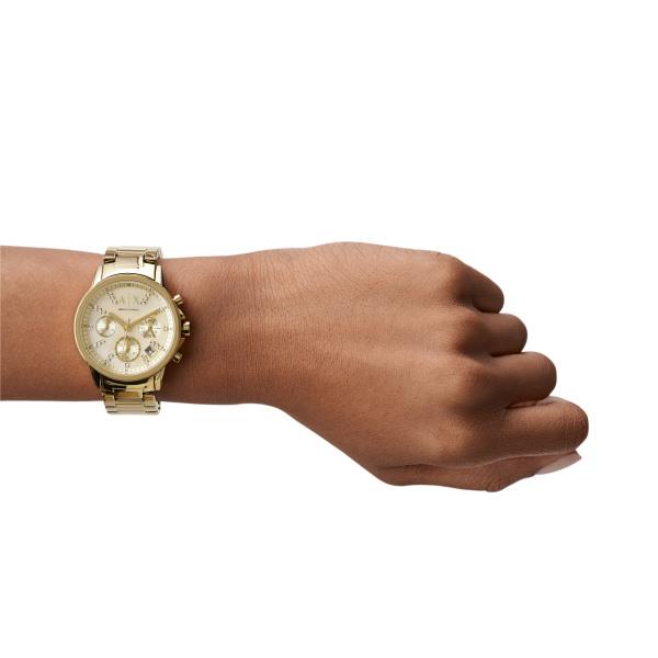 Gold dial quartz chronograph watch on wrist with steel link bracelet