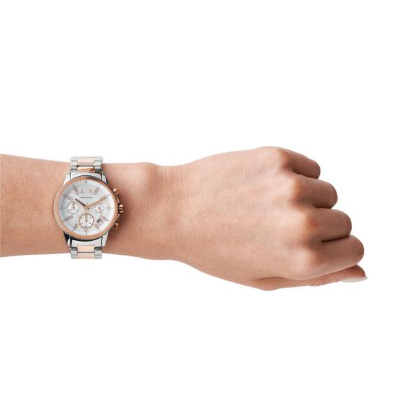 Ladies chronograph watch on wrist with light blue dial and silver rose-gold details