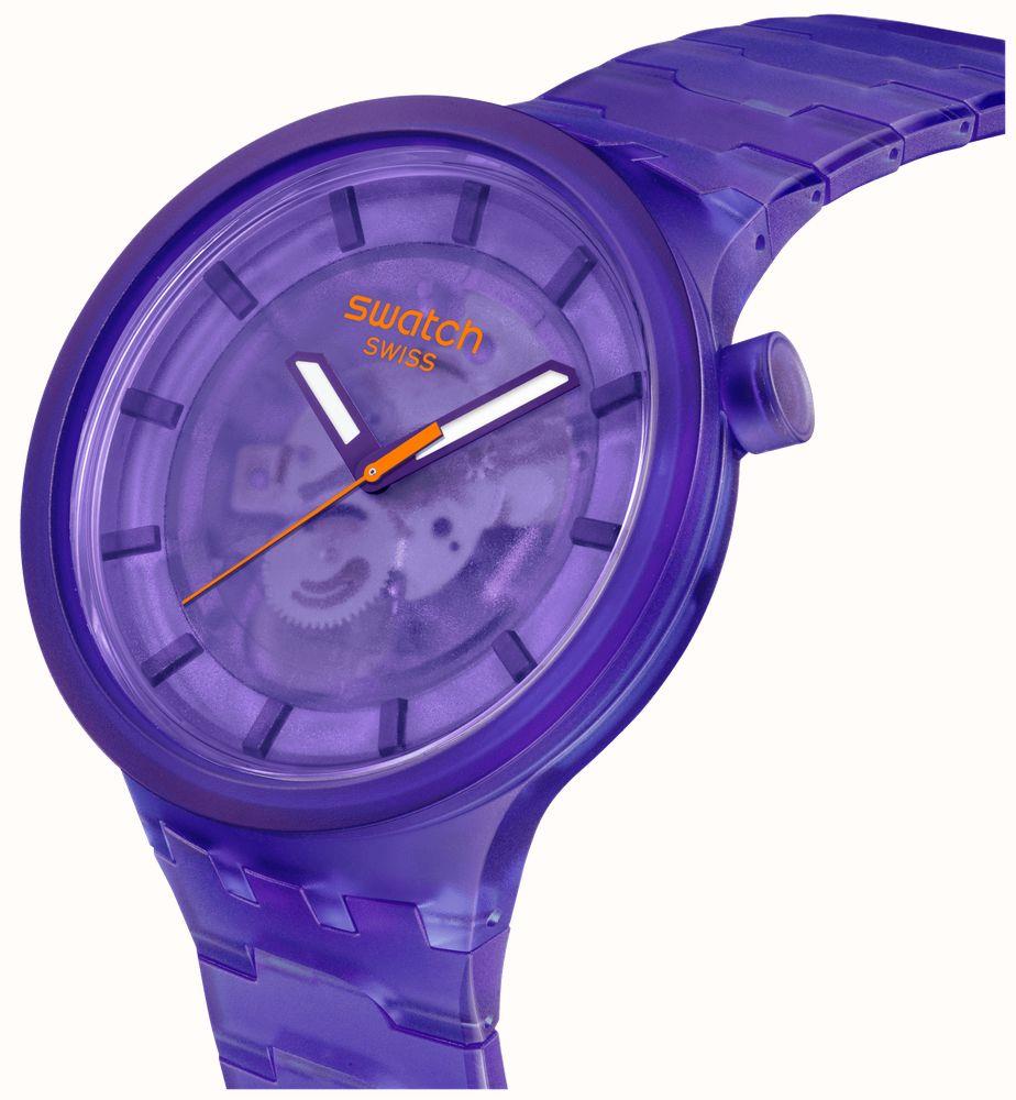 Purple Swatch strap watch with round dial, three hands, textured bio-sourced band