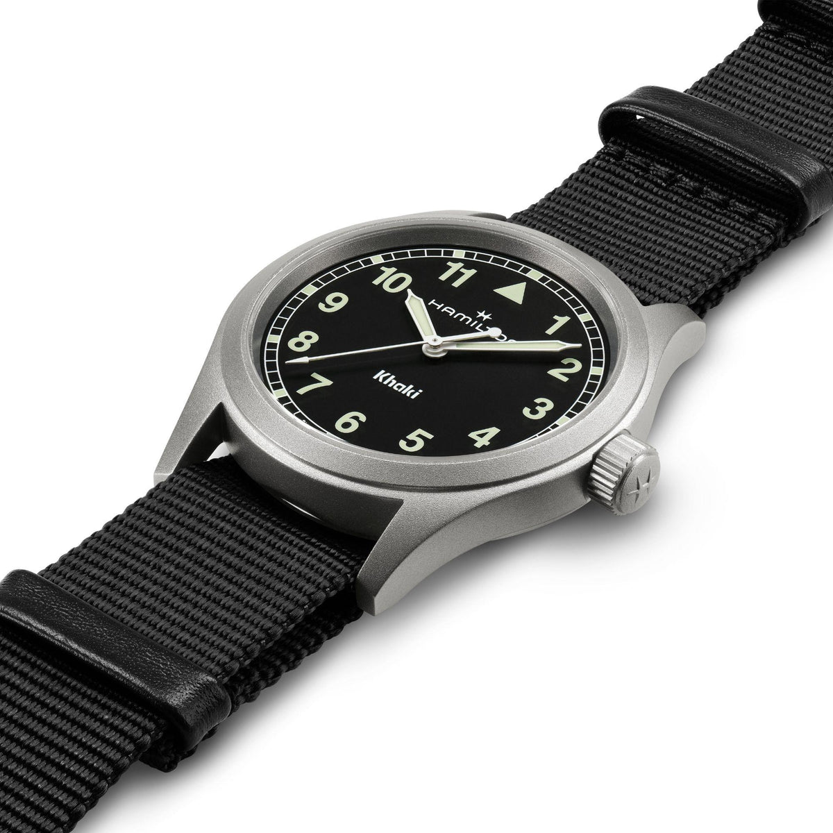 Hamilton Khaki Field H69401430 mens watch resting flat showing black dial, sandblasted steel case, and black NATO strap