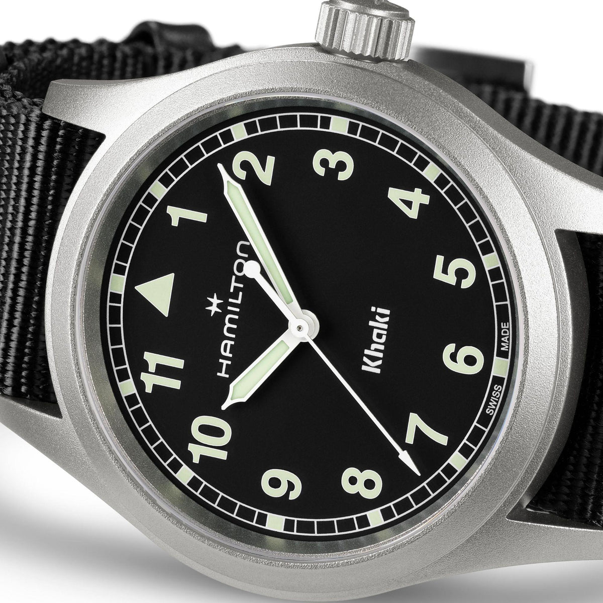 Hamilton Khaki Field H69401430 watch macro view highlighting matte stainless steel bezel, textured black dial, and crown