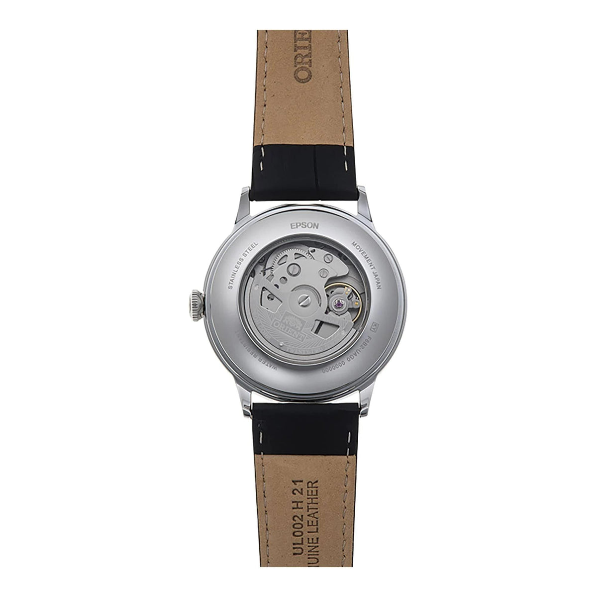 Men's wristwatch back profile with tan leather strap and stainless steel caseback detailing.