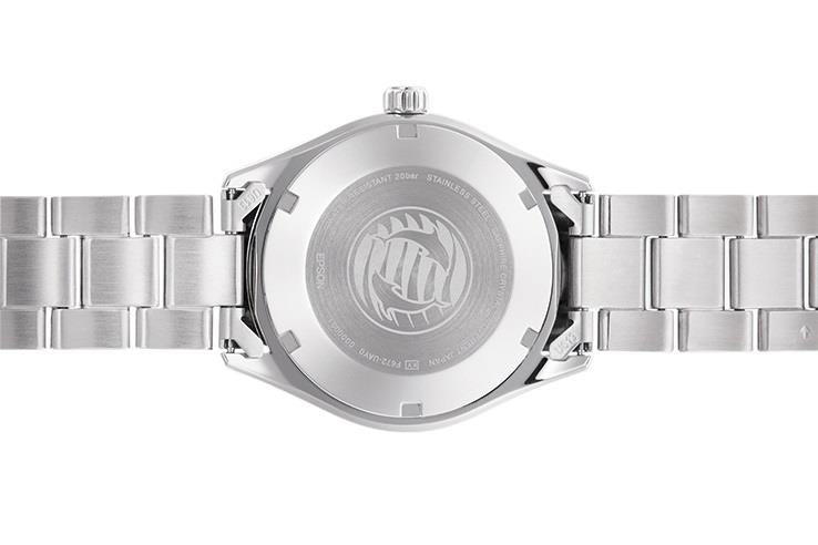 Steel watch caseback with engraved medallion and integrated bracelet