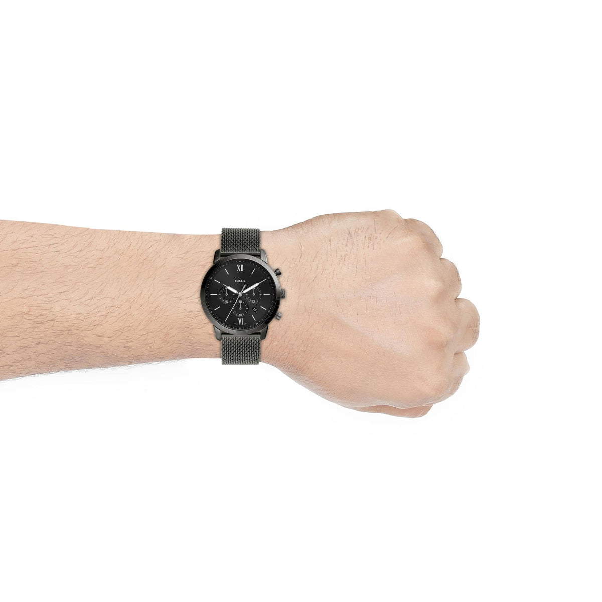 On-wrist studio view of the Fossil Neutra FS5699 mens watch displaying the dark-toned case and mesh strap