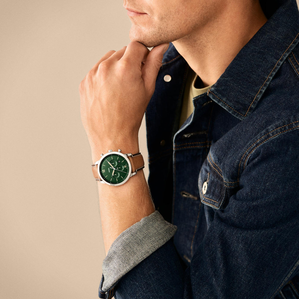 Fossil Neutra FS5963 lifestyle view of model wearing mens chronograph green dial quartz watch on wrist
