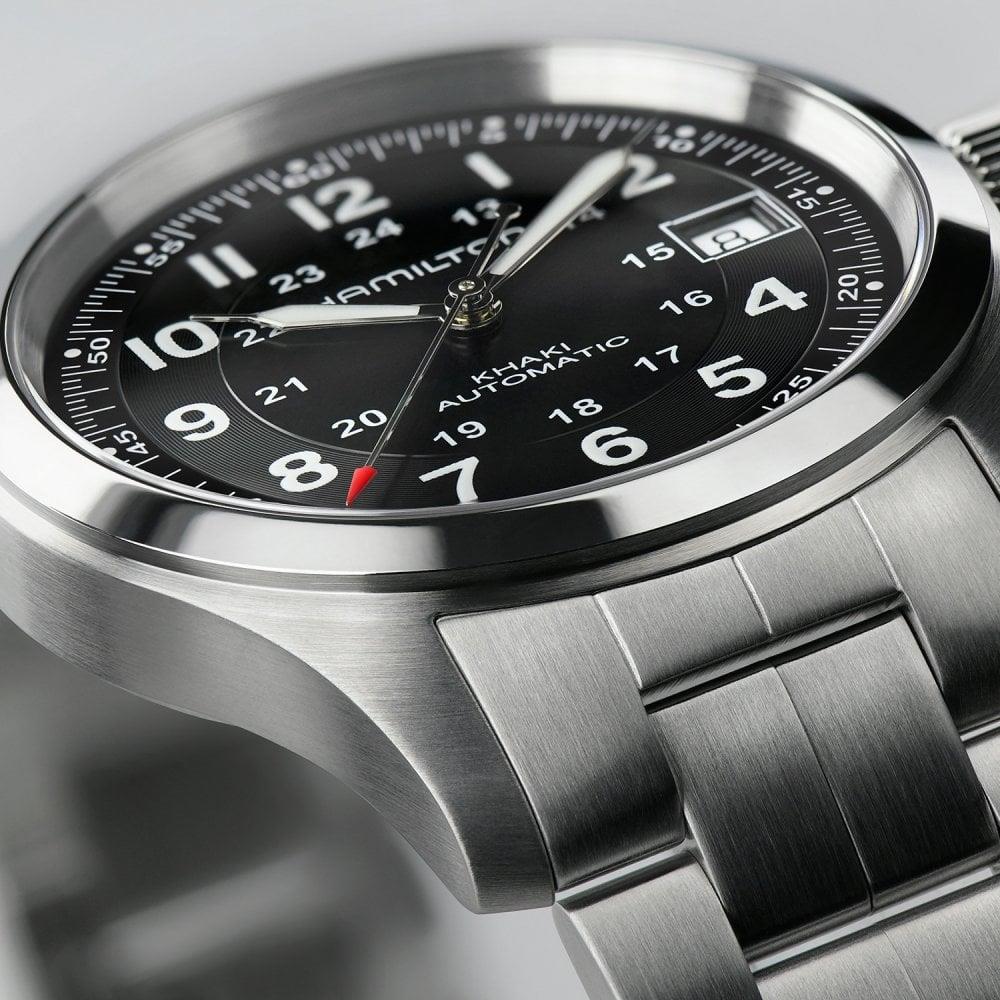 Close-up view detailing the brushed stainless steel case and crisp dial typography of the Hamilton Khaki Field H70455133
