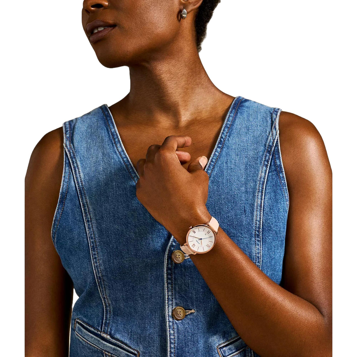 Fossil Jacqueline ES3988 36mm timepiece styled on a wrist, featuring a white dial, rose gold-tone bezel, and neutral leather strap