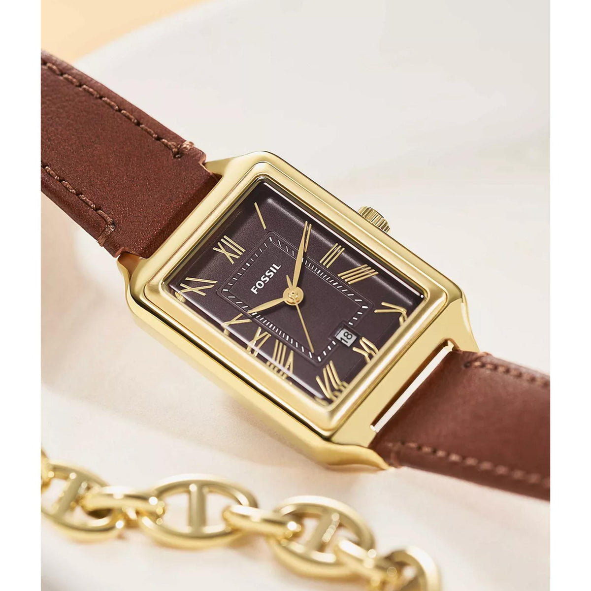 Fossil Raquel ES5303 close-up view of gray dial with gold Roman numerals and leather strap