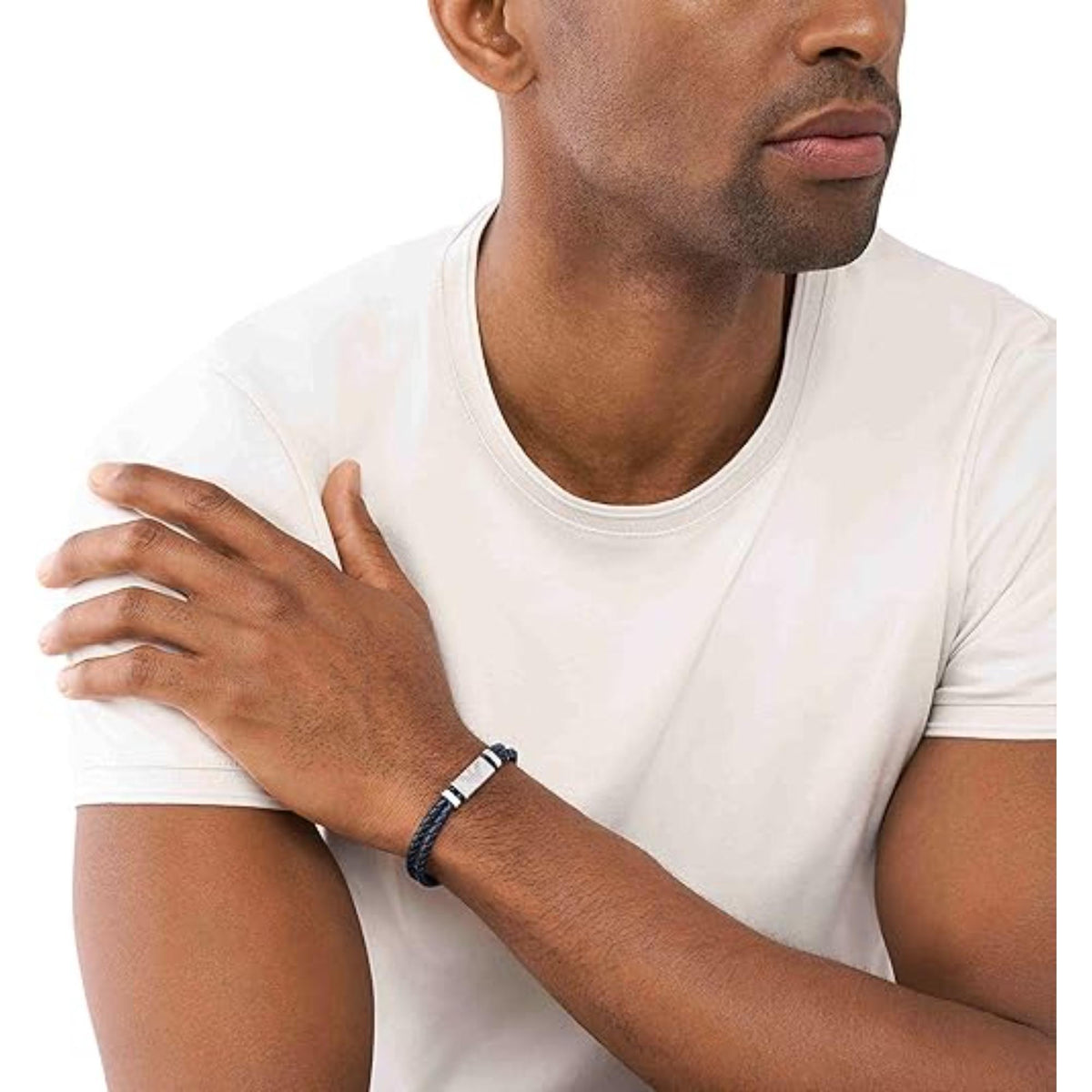 Model wearing Emporio Armani mens stainless steel and leather ID bracelet EGS2995040 with a casual outfit
